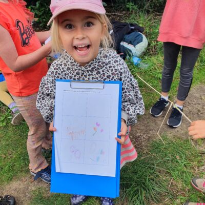 little girl with clip board